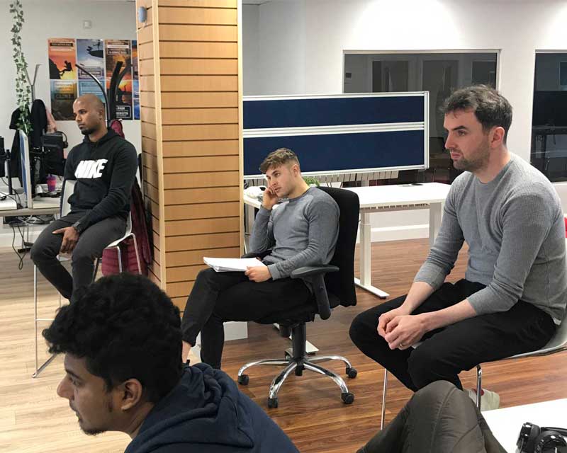 SportLoMo team collaborating in office